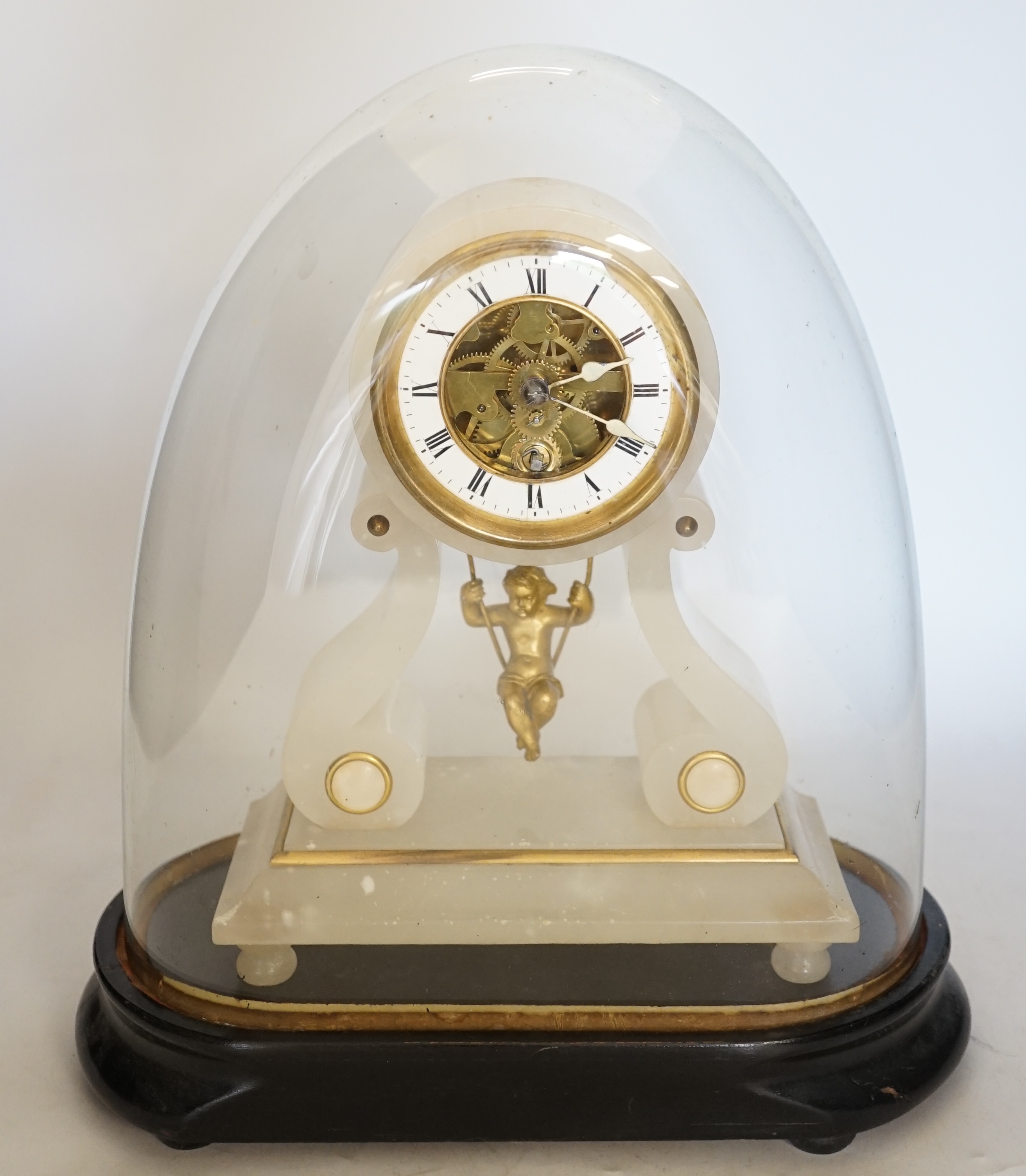 A 19th century French alabaster mantel clock under dome, 32cm total. Condition - fair to good